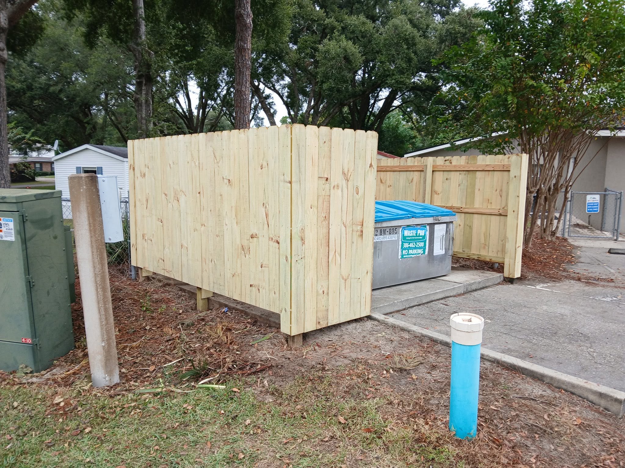 New wood commercial dumpster enclosure